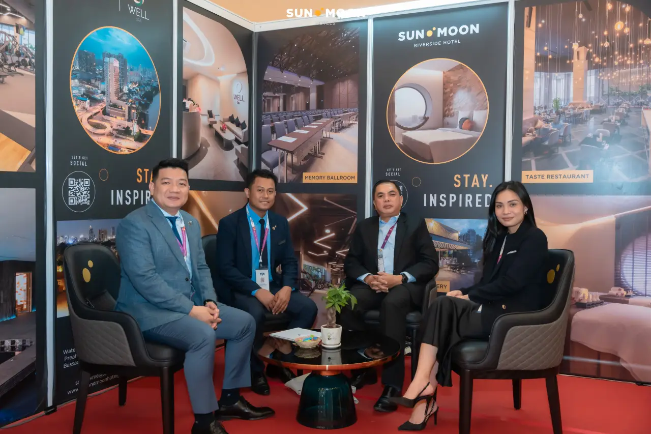 SUN & MOON HOTELS team at CAMFOOD & CAMHOTEL 2024 Expo booth in Phnom Penh.