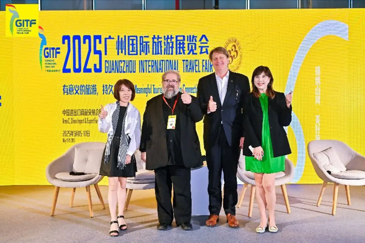 Tourism leaders pose at the GITF 2025 Meaningful Tourism Forum in Guangzhou